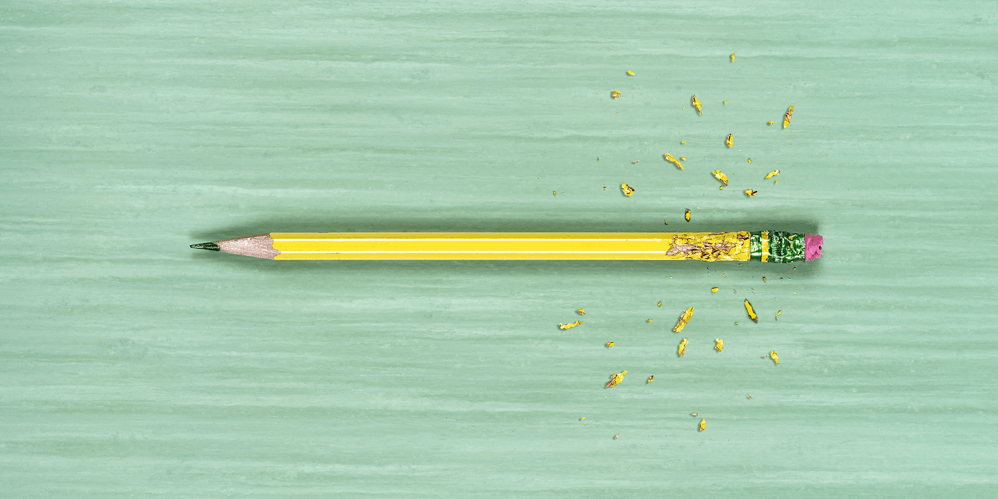 sharpened pencil that's chewed up just below the eraser